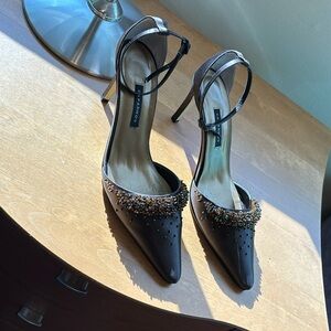 Dress heels with brown and gold beads and ankle strap.